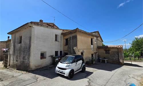 PORZIONE DI FABBRICATO DI AMPIA METRATURA, CASA SINGOLA E TERRENO